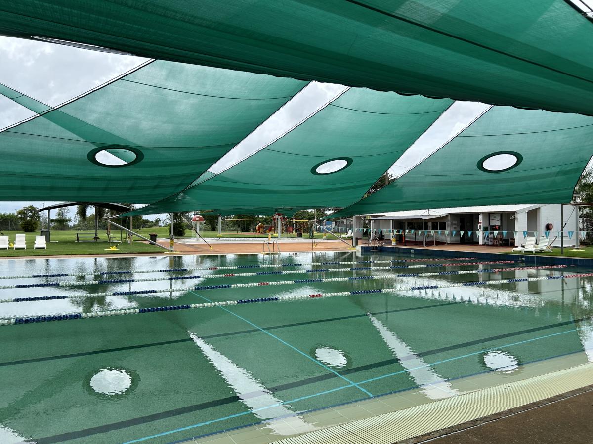 Swimming pool and shade sails